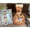 This is a handmade gourd vase made with a dried gourd. The front has butterfly artwork drawn on using pyrography tools.